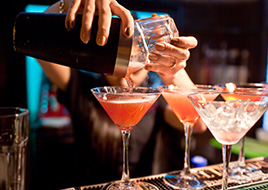 bartender pouring cocktails
